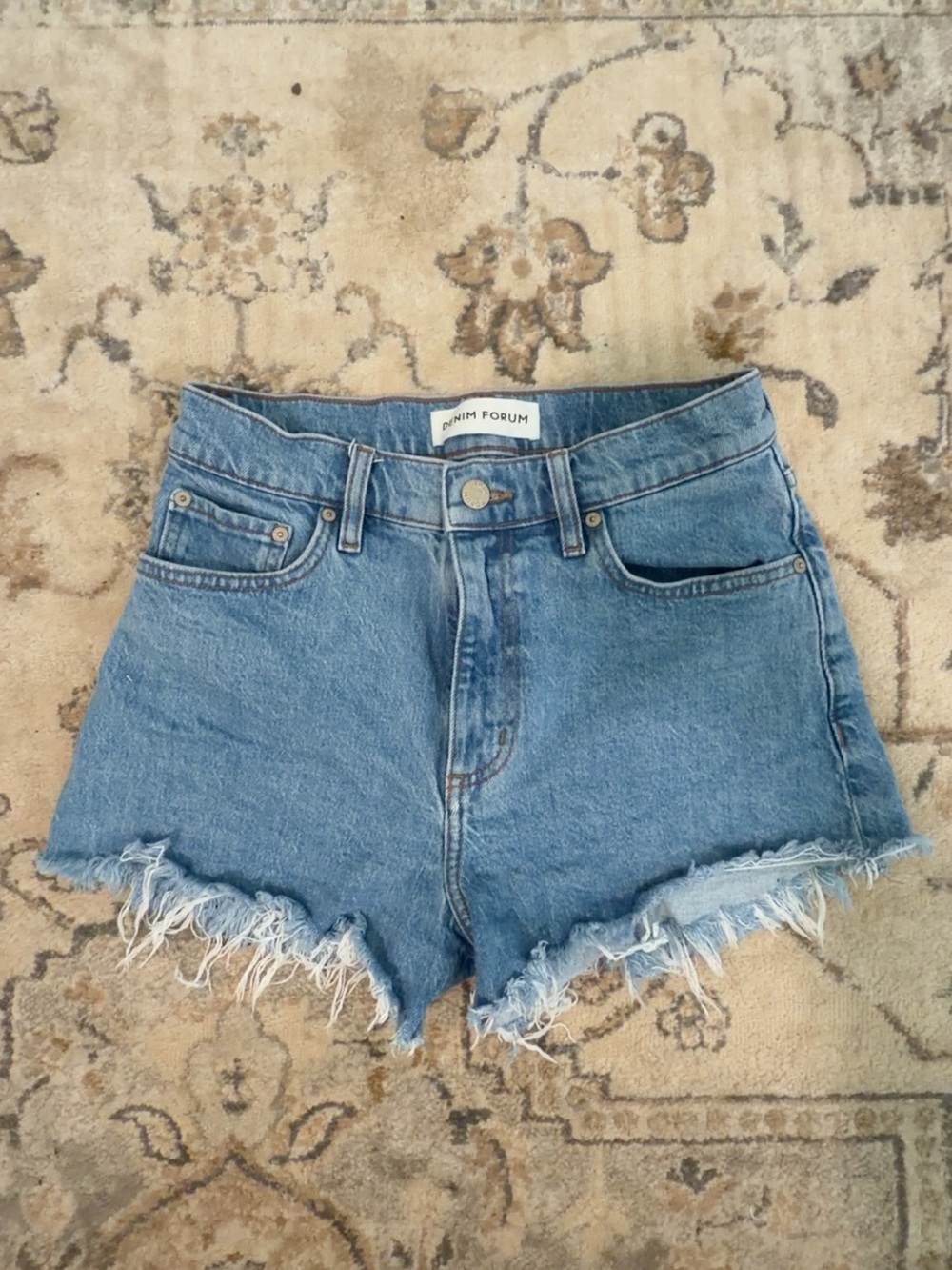 Aritzia Light Blue High-Rise Distressed Denim Shorts